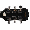 Rear headstock showing six chrome tuners, serial number, inspection sticker, and small finish chip along the upper edge. card