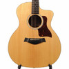Close-up of Taylor 214ce DLX natural spruce top, tortoiseshell pickguard, and ebony bridge. card