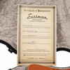 Eastman certificate of authenticity showing AC522CE-GB model and serial number M2147537. card