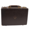 Closed brown Buffet Crampon clarinet case with gold-colored logo and worn exterior corners. card