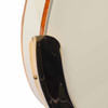 Close-up of gold armrest showing surface scratches and tarnishing along the upper edge. card