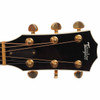 Taylor headstock with black face, white logo, gold tuning machines, and cream binding. card