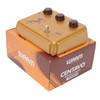 Warm Audio Centavo gold overdrive pedal displayed on its branded original product box. card