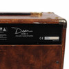 Close-up of Dean DA30-4 rear identification label, serial number, and worn brown cabinet covering. card