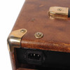Close-up of Dean DA30-4 amplifier top corner showing scuffed covering, small tear, metal corner protector, and AC inlet. card