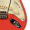 Close-up of pickup selector, cream control knobs, and small finish chip along the Fiesta Red body edge. card