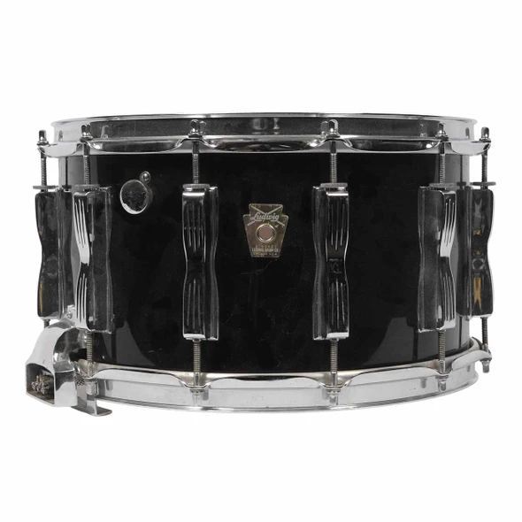 Side view of Ludwig black snare drum showing chrome hardware, Ludwig badge, and shell finish. card