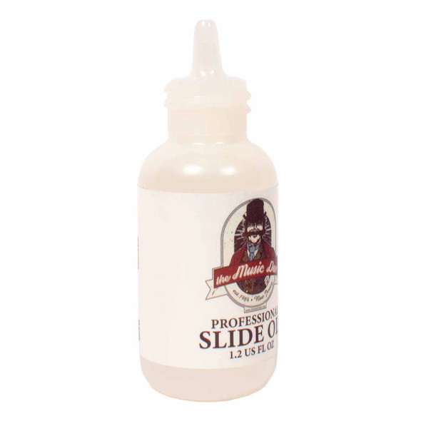 Angled view of The Music Den Professional Slide Oil 1.2 fl oz bottle showing the applicator tip and front product label. card