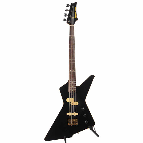 Full front view of black 1984 Ibanez Destroyer DT650 electric bass with angular body, rosewood fingerboard, and black headstock. card