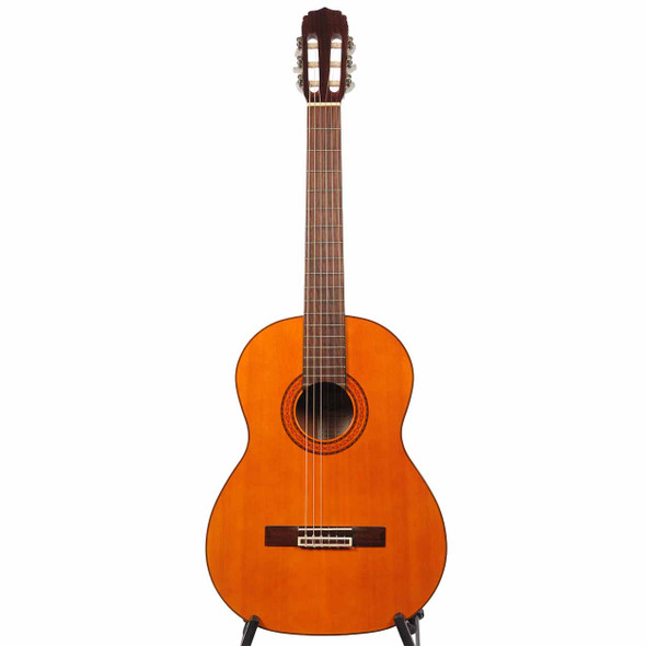 Full front view of Aria A-20 classical guitar with natural finish, slotted headstock, and dark fingerboard. card