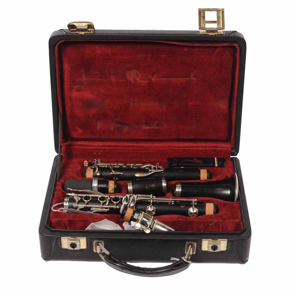 Open hard case with the 1997 Buffet Crampon R13 clarinet, mouthpiece, barrel, and included accessories. card