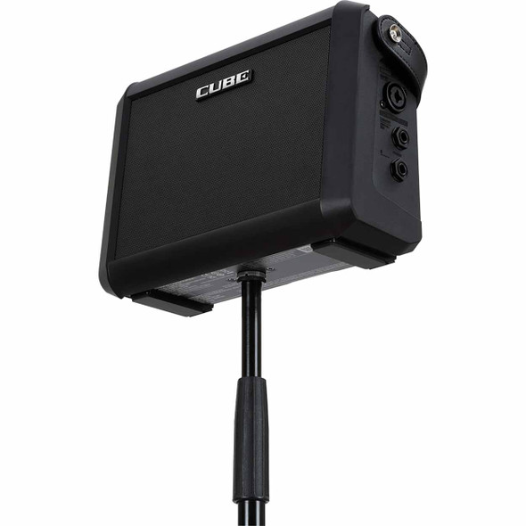 Bottom angled view of the Roland CUBE Street Mini amplifier mounted on a speaker stand using the integrated pole mount. card