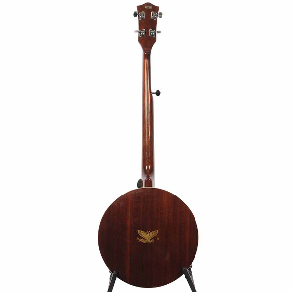 Full rear view of Lyle 5-string banjo showing dark wood neck and closed-back resonator with gold eagle graphic. card