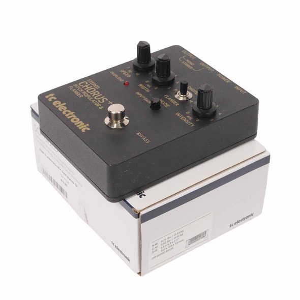 Three-quarter view of the TC Electronic SCF Gold Stereo Chorus+ Pitch Modulator & Flanger pedal displayed on its original product box. card