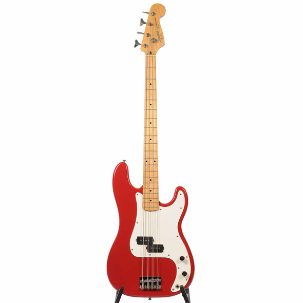 Full front view of red Squier II Precision Bass with maple neck and white pickguard. card