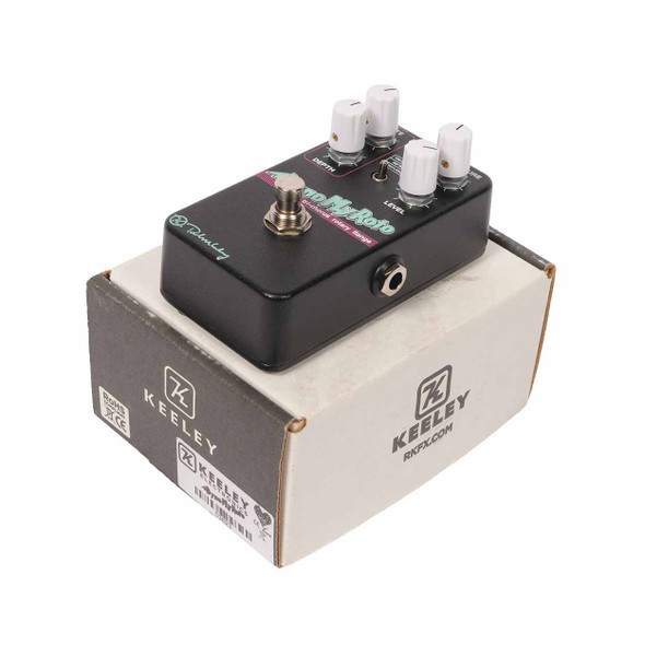 Keeley Dyno My Roto modulation pedal displayed with its original Keeley cardboard box card