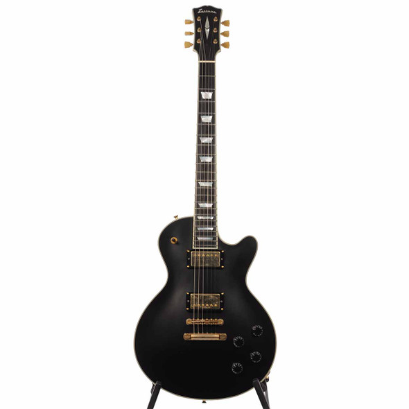 Full front view of black Eastman SB57N-BK single-cut electric guitar with cream binding and gold hardware. card
