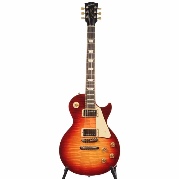 Full front view of Gibson Les Paul Heritage Cherry Sunburst electric guitar on a stand. card
