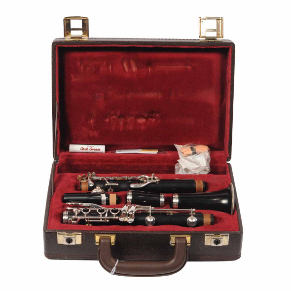 Disassembled Buffet clarinet inside open brown case with red plush lining and accessories. card