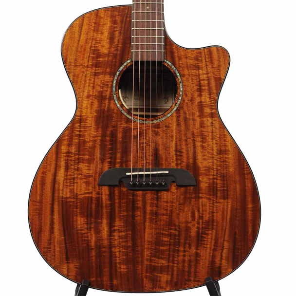Close front view of Alvarez RG99KCE-ELITE acoustic-electric guitar showing figured koa top, cutaway body, abalone rosette, and dark bridge. card