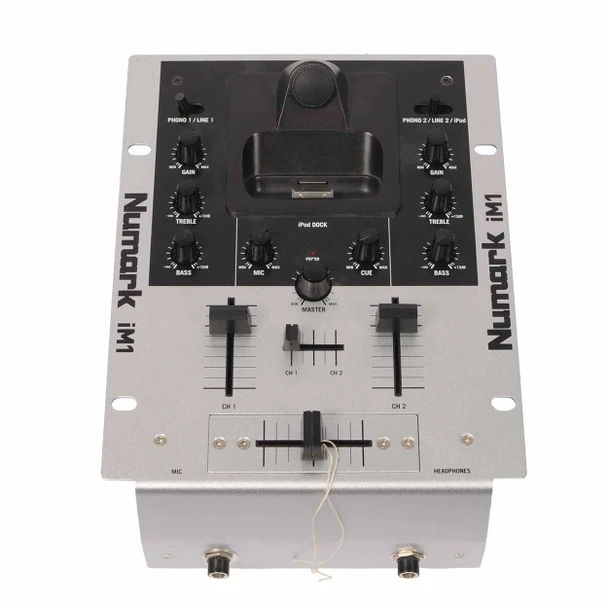 Top view of Numark iM1 DJ mixer showing two channels, crossfader, controls, and iPod dock. card