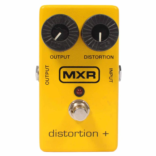 Front view of yellow MXR Distortion+ pedal with Output and Distortion knobs, red LED, and footswitch. card