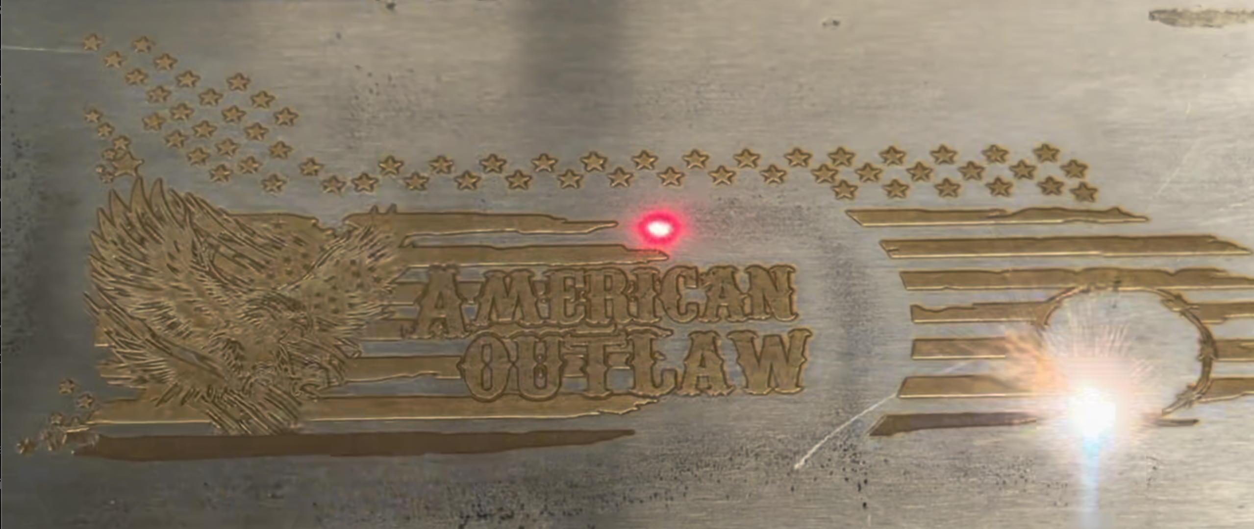 The American Outlaw shotgun with eagle engraving and upgraded English walnut stock