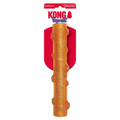 Orange stick-shaped dog toy with grip texture. Shown in its retail packaging.