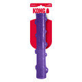 Purple stick-shaped dog toy with raised bumps. Shown in its retail packaging.