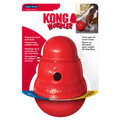 Red beehive-shaped treat dispensing dog toy with center hole. Shown in its retail packaging.