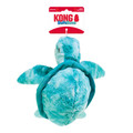 Green Turtle plush dog toy with soft body and floppy arms. Shown in its retail packaging.