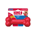 Red bone-shaped dog toy with textured ends. Shown in its retail packaging.