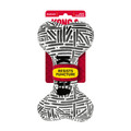 Black and white bone-shaped plush dog toy with printed pattern. Shown in its retail packaging.