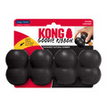 Black cylindrical dog toy with three stacked tiers and textured surface. Shown in its retail packaging.