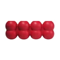 Red cylindrical dog toy with three stacked tiers and textured surface.