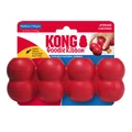 Red cylindrical dog toy with three stacked tiers and textured surface. Shown in its retail packaging.