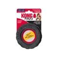Black tire shaped dog toy with hollowed out center.  Shown in its retail packaging.