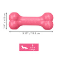 Pink bone-shaped dog toy with textured ends. Shown with product dimensions