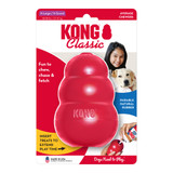 Red natural rubber KONG shaped dog toy with three tiers and “KONG” embossed. Shown in its retail packaging.