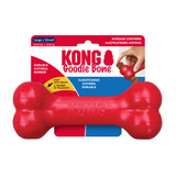Red bone-shaped dog toy with textured ends. Shown in its retail packaging.