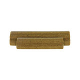 Two cylindrical dog treats with speckled surface, arranged side by side.