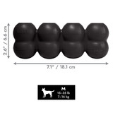 Black cylindrical dog toy with three stacked tiers and textured surface. Shown with product dimensions