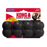 Black cylindrical dog toy with three stacked tiers and textured surface. Shown in its retail packaging.