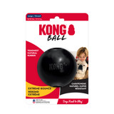 Black natural rubber ball dog toy with “KONG” embossed. Shown in its retail packaging.