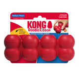 Red cylindrical dog toy with three stacked tiers and textured surface. Shown in its retail packaging.