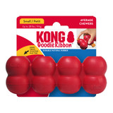 Red cylindrical dog toy with three stacked tiers and textured surface. Shown in its retail packaging.