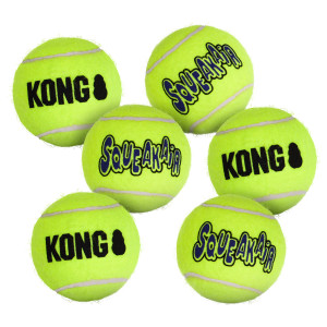 Neon green tennis ball dog toy with KONG printed.