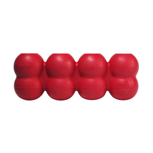 Red cylindrical dog toy with three stacked tiers and textured surface.