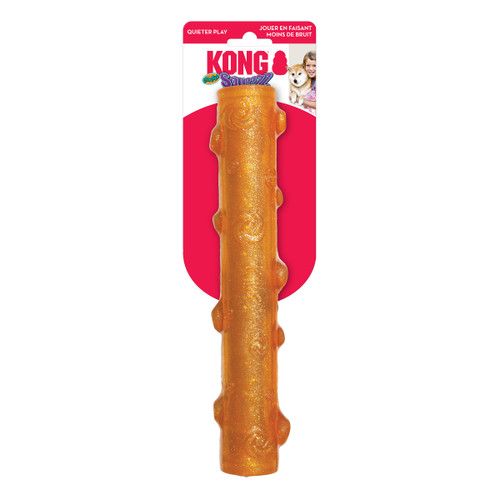 Orange stick-shaped dog toy with grip texture. Shown in its retail packaging.