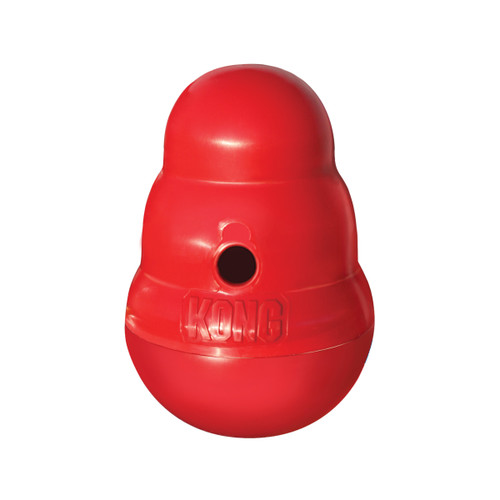 Red beehive-shaped treat dispensing dog toy with center hole.